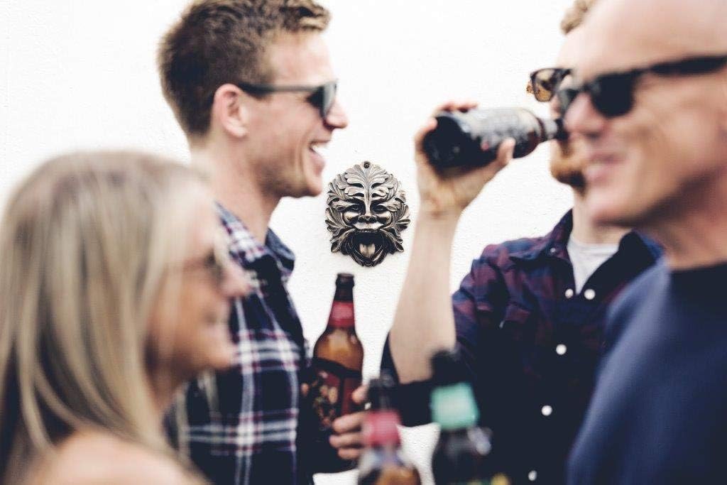 Novelty Bottle Opener - Bronze Finish Wall Mounted Miniature Footballer. Includes fixtures and fittings.